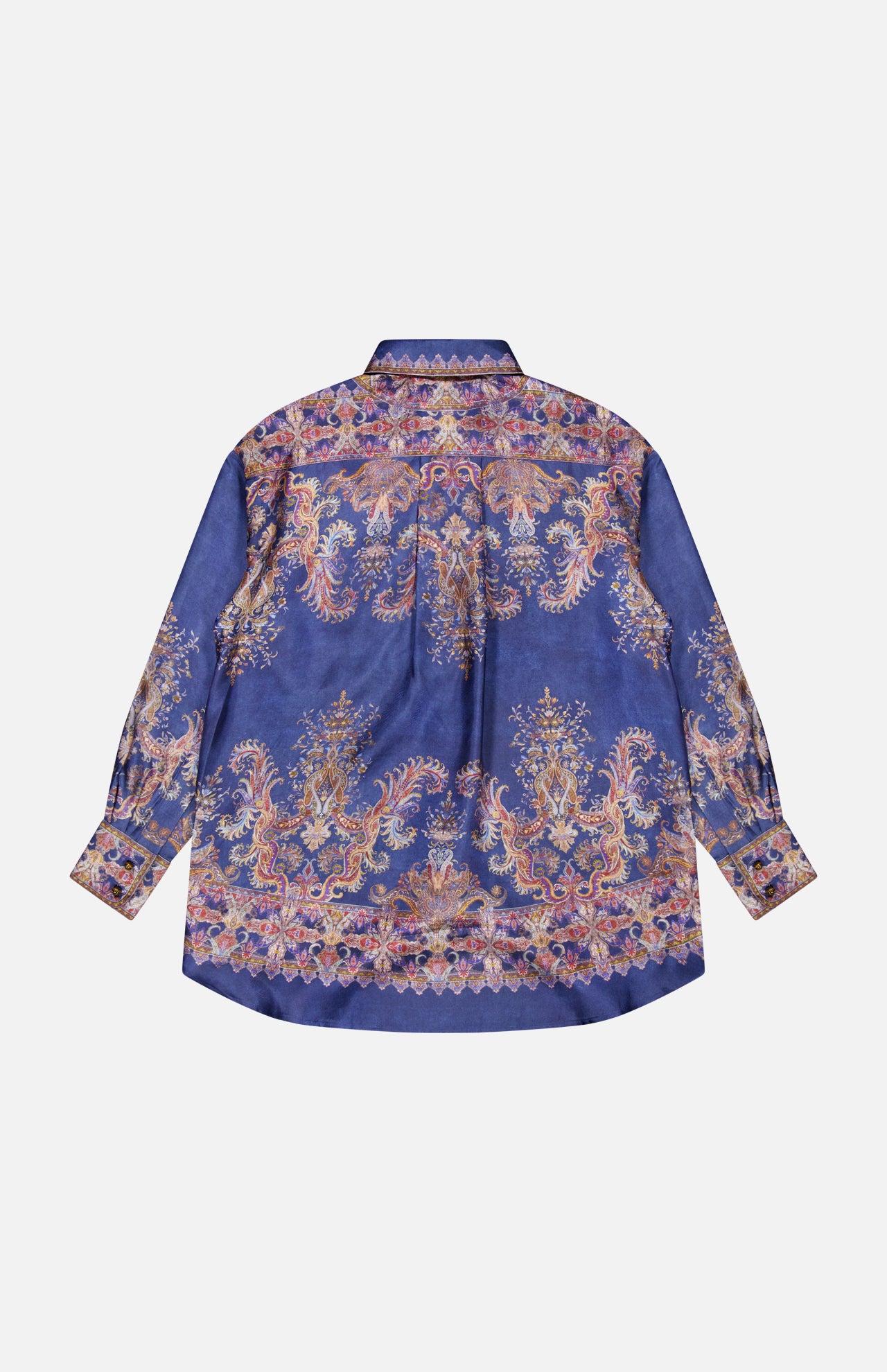 The ZIMMERMANN Valiant Relaxed Bow Collar Shirt is a designer women’s long-sleeve button-up, featuring a blue base adorned with intricate gold, pink, and purple paisley patterns, shown from the back against a plain white background.