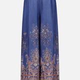Crafted by ZIMMERMANN, the Valiant Paisley Print Track Pant showcases a striking navy paisley print with delicate gold and pink floral accents. These high-rise, wide-leg silk pants feature an elasticized waistband and slightly cropped length for effortless comfort, offering a luxurious drape that elevates any ensemble.
