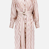 Introducing the ZIMMERMANN Valiant Tuck Striped Shirt Dress—a long-sleeved, button-down midi dress featuring striking vertical rose stripes in red and white. This elegant style includes a belted waist, cuffed sleeves, a flattering v-neckline, and gold buttons along the front for a polished finish.