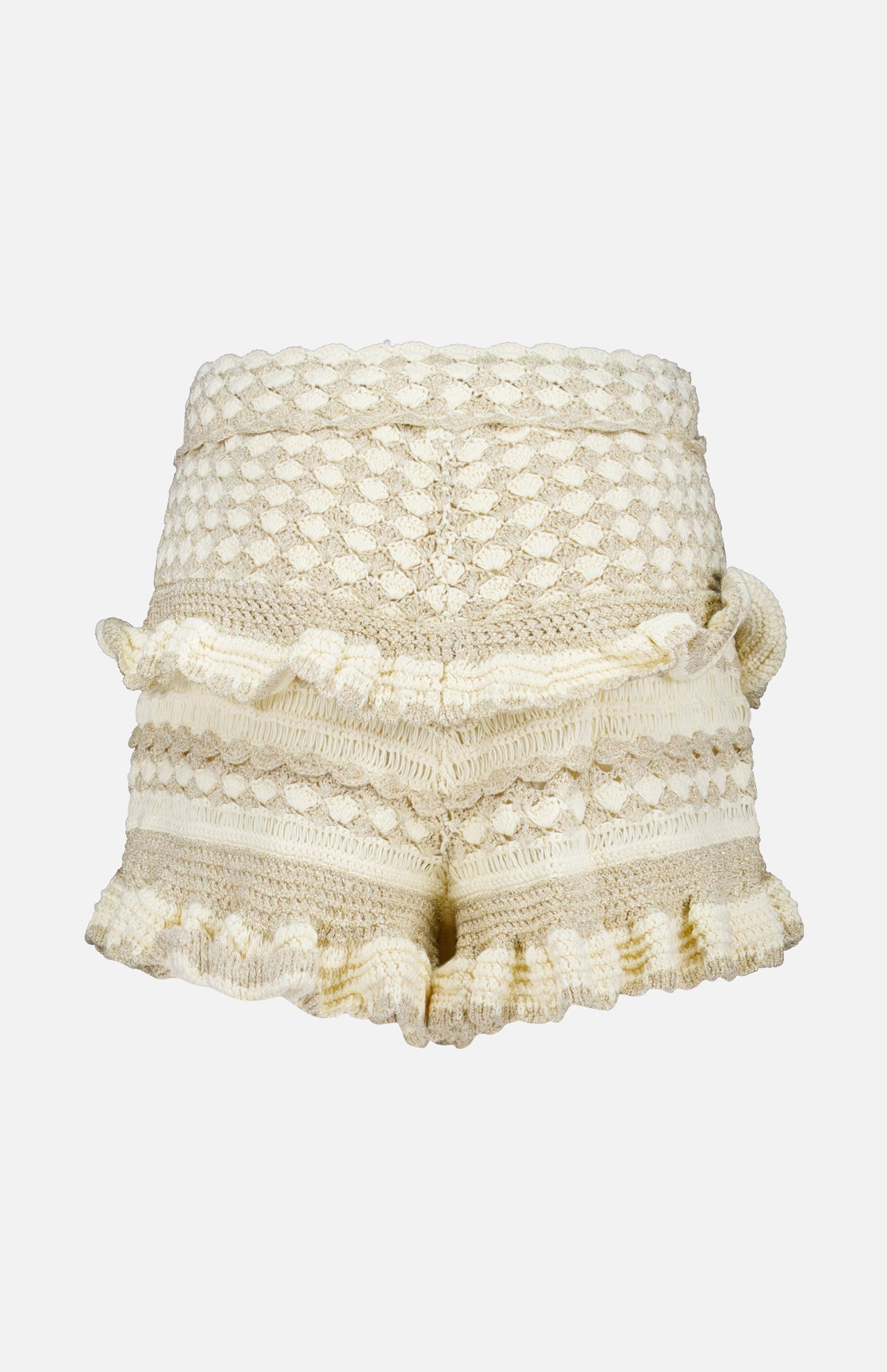 The ZIMMERMANN Wanderlust Crochet Short features a cream color, high-waisted fit, textured patterns, ruffled edges, and decorative pom-poms, shown against a plain white background.