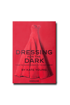 The cover of Dressing For The Dark by ASSOULINE features a red evening gown on a red background, highlighting fashion in film and red carpet style, with the title and publisher elegantly displayed.