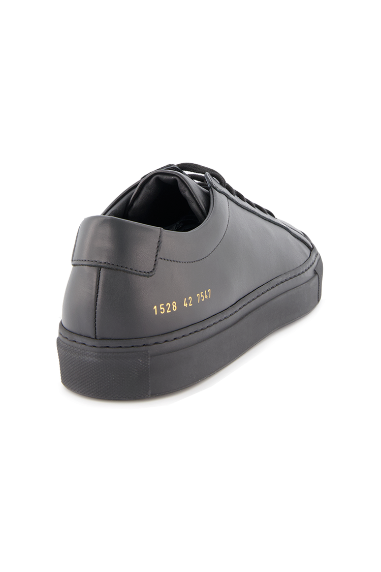 Back angled view image of Common Projects Original Achilles Low Sneaker Leather Black (600678727691)
