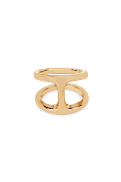 The Dame Phantom Ring by HOORSENBUHS is a modern gold piece with two parallel bands joined by a T-shaped bridge—an elevated, unisex geometric design.
