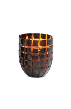 The ONNO Forever Crystal M Gold is a dark, checkered glass candle holder with a hand-poured candle, casting a warm glow—perfect for adding luxury candles to your decor.