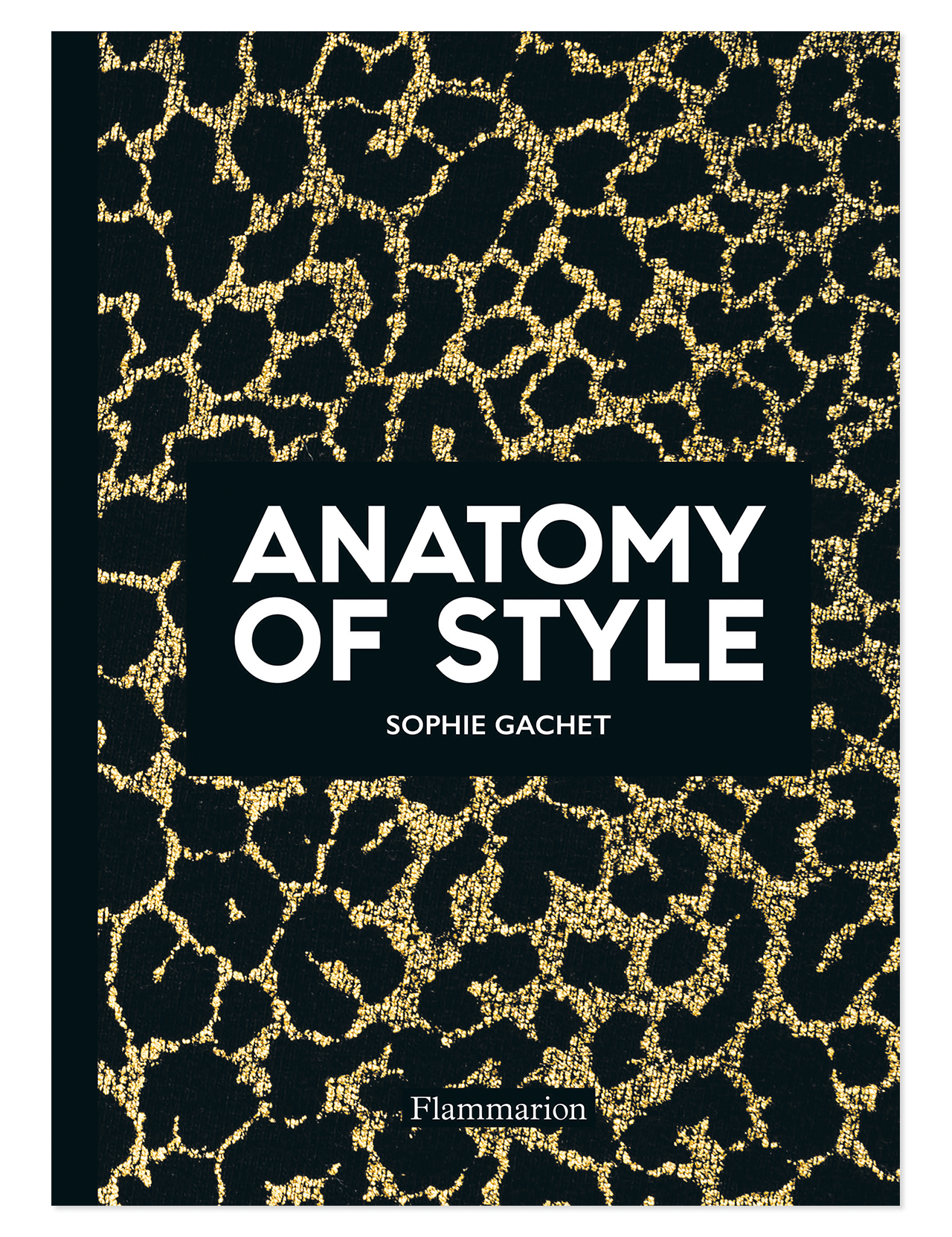 The Anatomy Of Style cover by FLAMMARION has bold white text on black, accented with a gold abstract animal print, echoing fashion trends and inspiration, with the publisher’s name at the bottom.