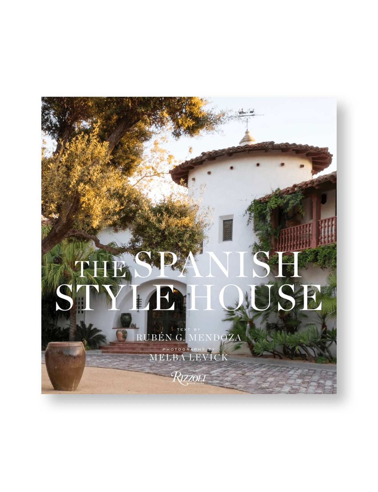 The cover of The Spanish Style House by PENGUIN RANDOM HOUSE shows a classic white stucco Southern California home with a round tower, red-tiled roof, lush greenery, and a terracotta pot in front.