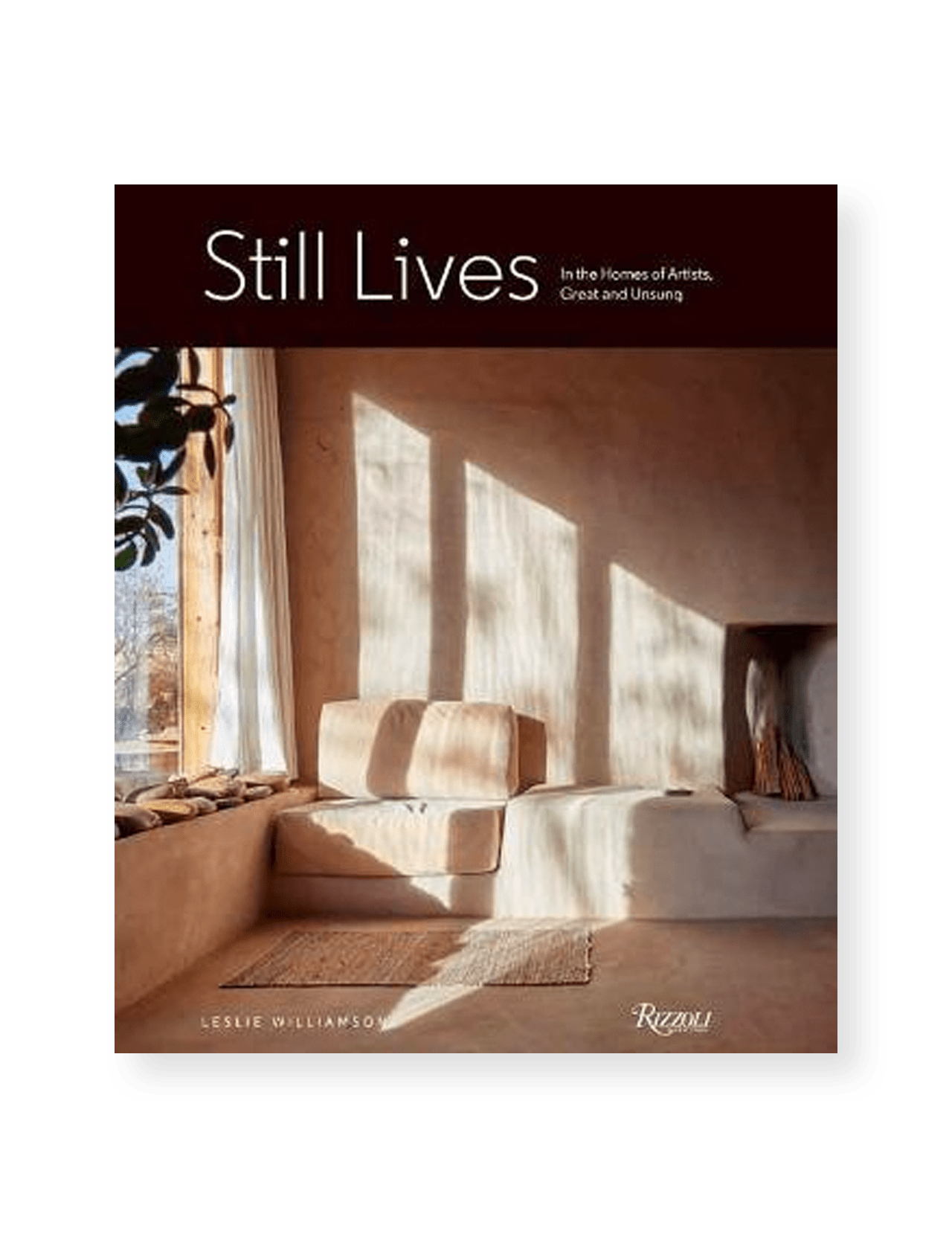 The cover of "Still Lives" by RIZZOLI shows a sunlit minimalist living room with a white armchair, wooden accents, textured walls, and patterned shadows cast by a window.