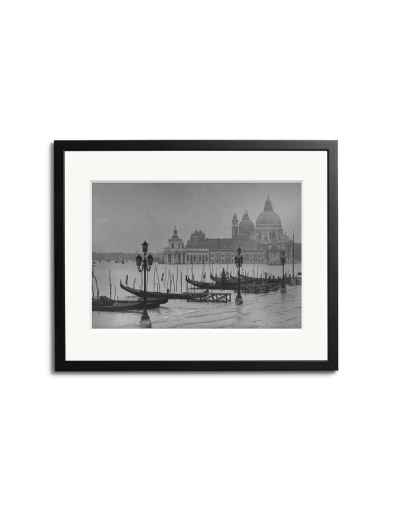 Moored Gondolas" by SONIC EDITIONS features a black-and-white photo of Venice's gondolas, lampposts, and a domed church, elegantly framed with a black border—perfect decor for Piazza San Marco enthusiasts.