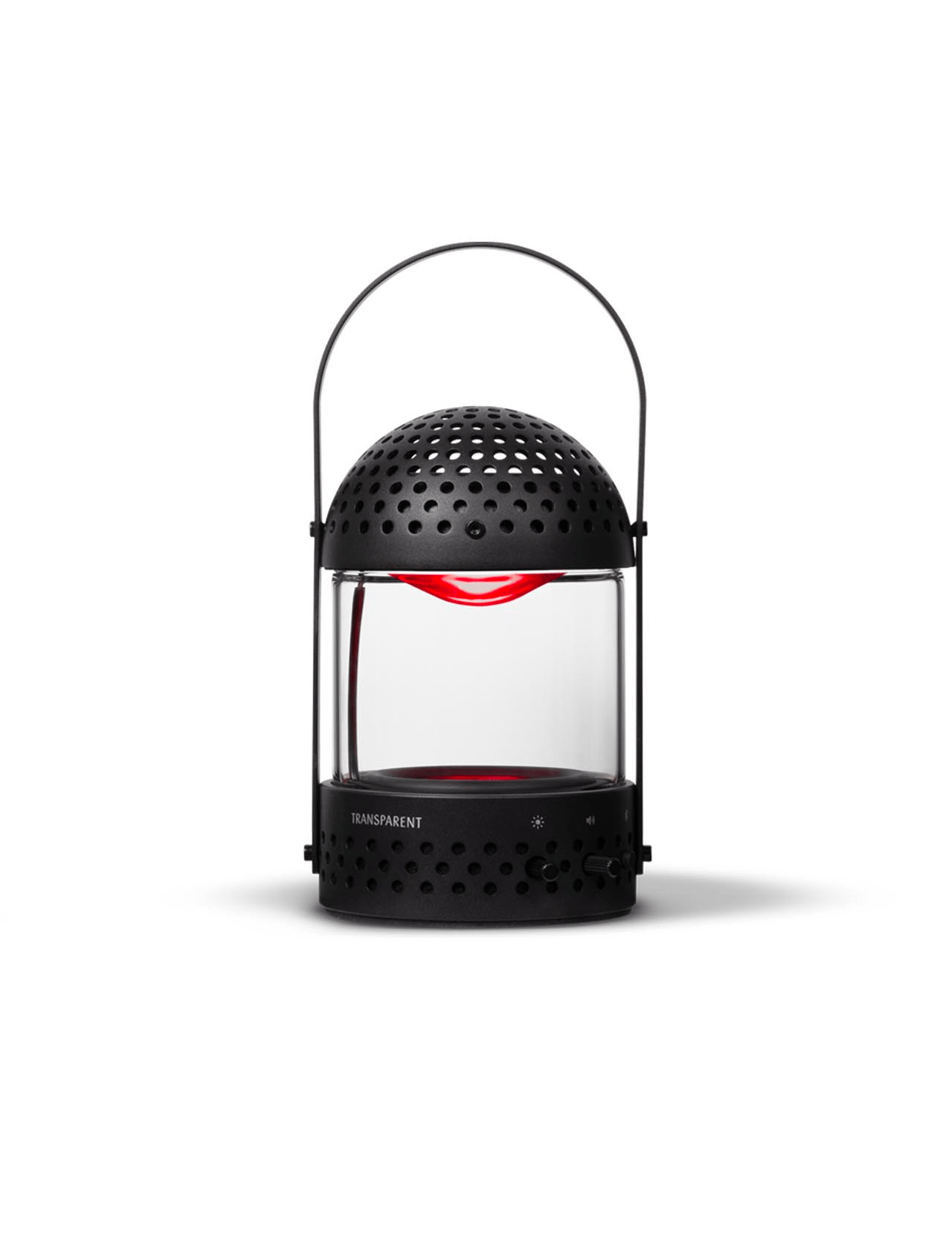 The TRANSPARENT Light Speaker is a modern black aluminum lantern-style portable sound system with a perforated dome top, borosilicate glass cylinder body, visible red cord, and the brand name printed on the lower front.